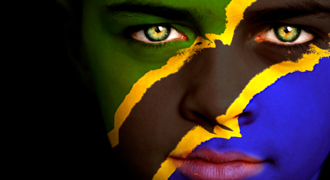 Image of Tanzanian flag painted on a young boy's face